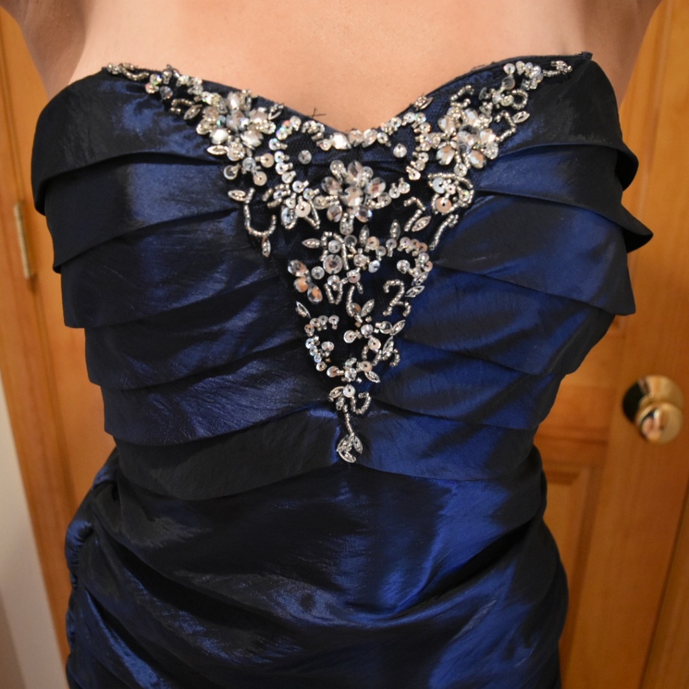 Deep blue ball gown style prom dress